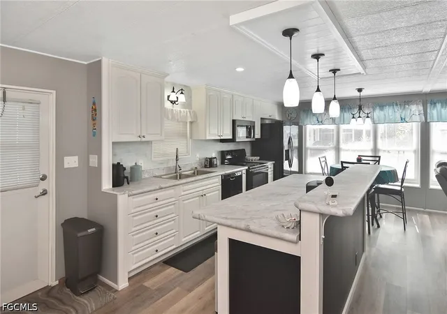 Photo 2 of Manufactured home for sale at 114 Snead Dr, North Fort Myers, FL 33903 | MLS# 2026037739 | Listing updated on 2026-09-09