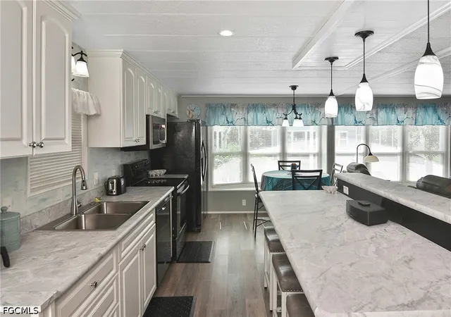 Photo 4 of Manufactured home for sale at 114 Snead Dr, North Fort Myers, FL 33903 | MLS# 2026037739 | Listing updated on 2026-09-09