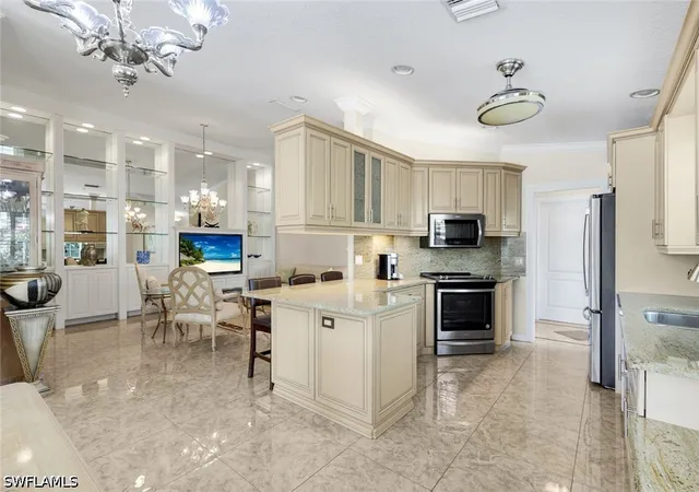 Photo 3 of Townhouse for sale at 5808 Drummond Way, Naples, FL 34119 | MLS# 226031670 | Listing updated on 2026-09-10