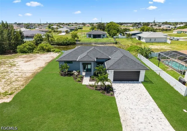 Photo 2 of Single family home for sale at 1024 Ne 1st Place, Cape Coral, FL 33909 | MLS# 2026037797 | Listing updated on 2026-09-13