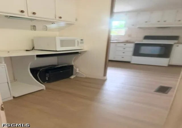 Photo 3 of Manufactured home for sale at 7680 Helen Rd, Bokeelia, FL 33922 | MLS# 2026037800 | Listing updated on 2026-09-08