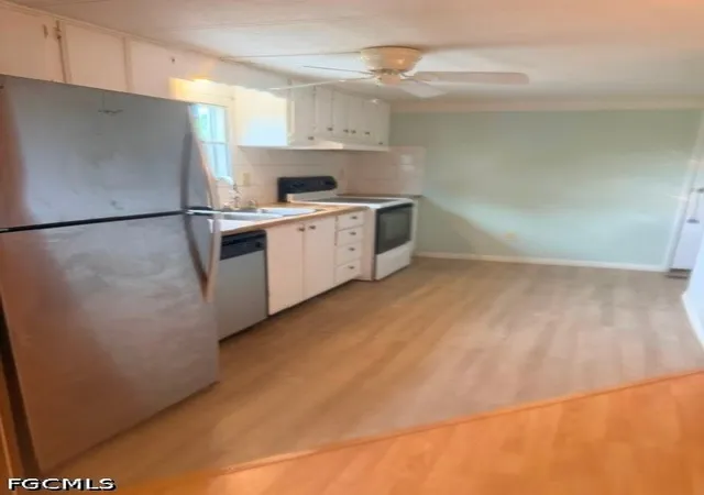 Photo 4 of Manufactured home for sale at 7680 Helen Rd, Bokeelia, FL 33922 | MLS# 2026037800 | Listing updated on 2026-09-08