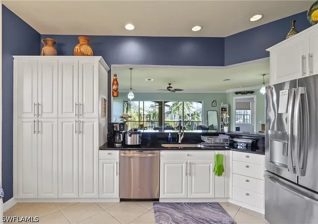 Listing Photo 4 - Condo for sale in building located at 5021 Maxwell Cir #201, Naples, FL 34105 - Unit #3-201