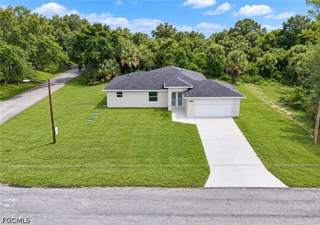 Photo 1 of Single family home for sale at 1801 E 8th Street, Lehigh Acres, FL 33972 | MLS# 2026037919 | Listing updated on 2026-09-13