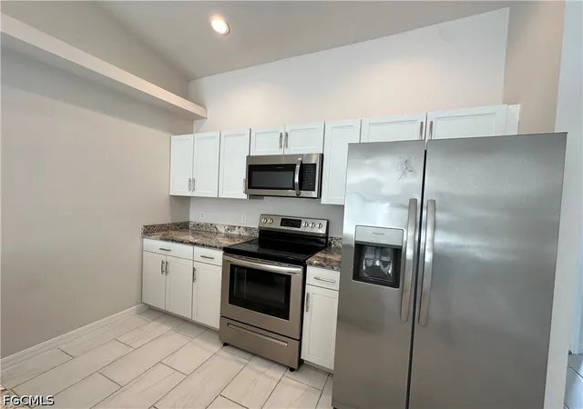 Listing Photo 5 - Condo for sale in building located at 4410-4412 Skyline Blvd, Cape Coral, FL 33914