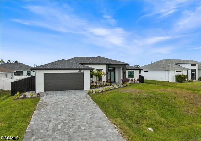Photo 2 of Single family home for sale at 2015 Nw 21st Street, Cape Coral, FL 33993 | MLS# 2026037952 | Listing updated on 2026-09-09