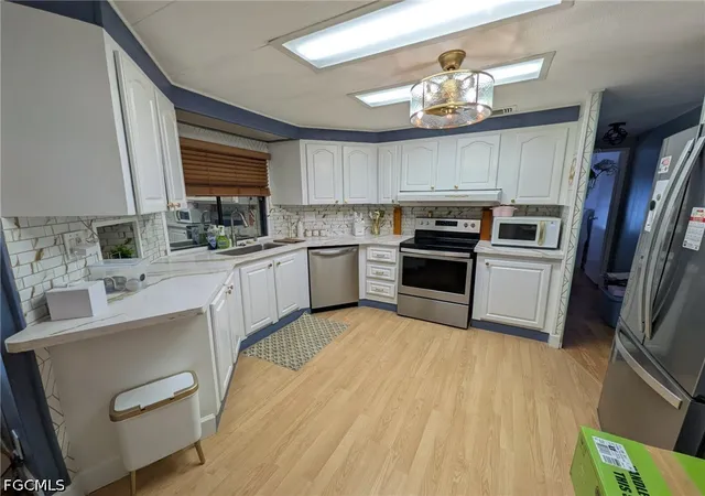 Photo 2 of Manufactured home for sale at 9033 Flamingo Cir, North Fort Myers, FL 33903 | MLS# 2026037982 | Listing updated on 2026-09-09