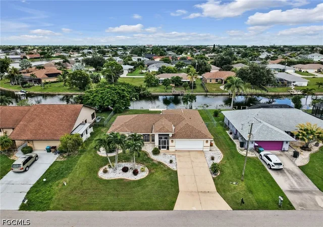 Photo 3 of Single family home for sale at 323 SE 9th Avenue, Cape Coral, FL 33990 | MLS# 2026038077 | Listing updated on 2026-09-11