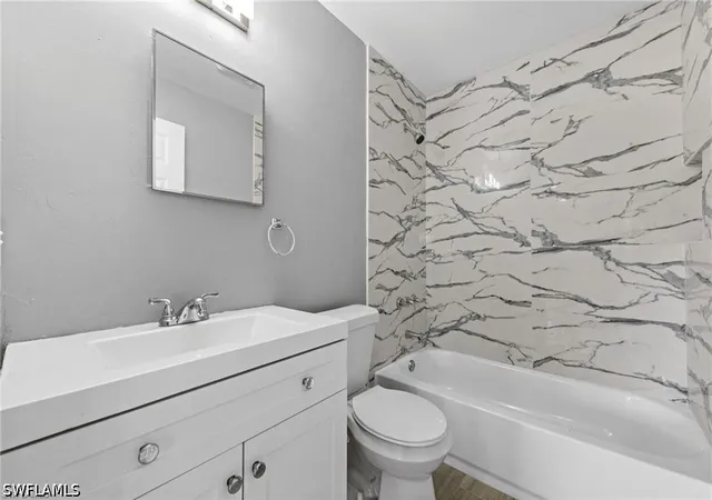 Listing Photo 2 - Condo for sale in building located at 109/111 Gordon Ave S, Lehigh Acres, FL 33973 - Unit #