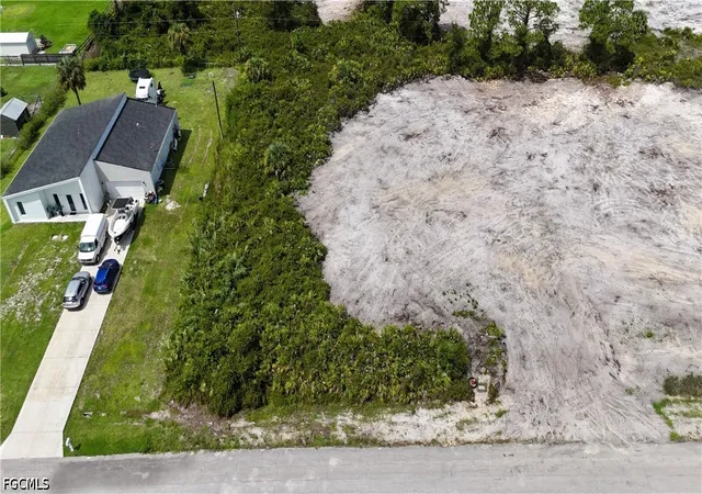 Photo 1 of Sale Pending at 1215 Poinsettia Ave, Lehigh Acres, FL 33972 | MLS# 2026038113 | Listing updated on 2026-10-09
