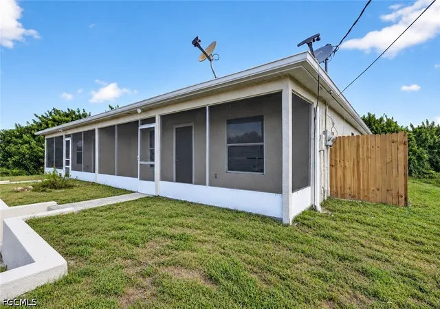 Listing Photo 2 - Condo for sale in building located at 4732/4734 Leonard Blvd S, Lehigh Acres, FL 33973 - Unit #