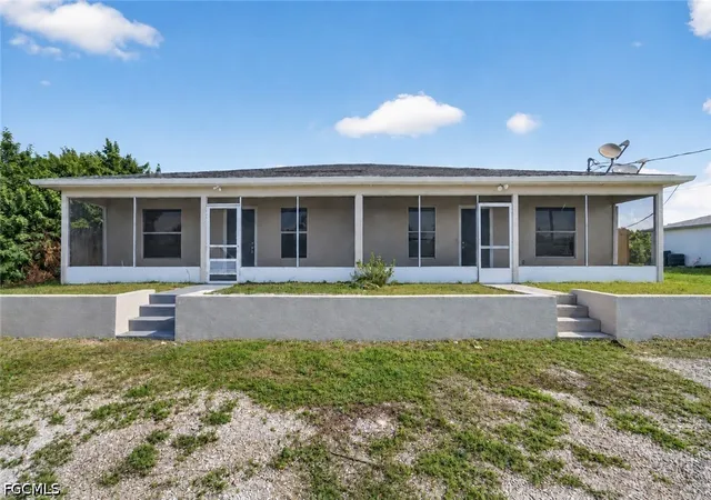 Photo 1 of Multi family home for sale at 4732/4734 Leonard Blvd S, Lehigh Acres, FL 33973 | MLS# 2026038176 | Listing updated on 2026-09-11