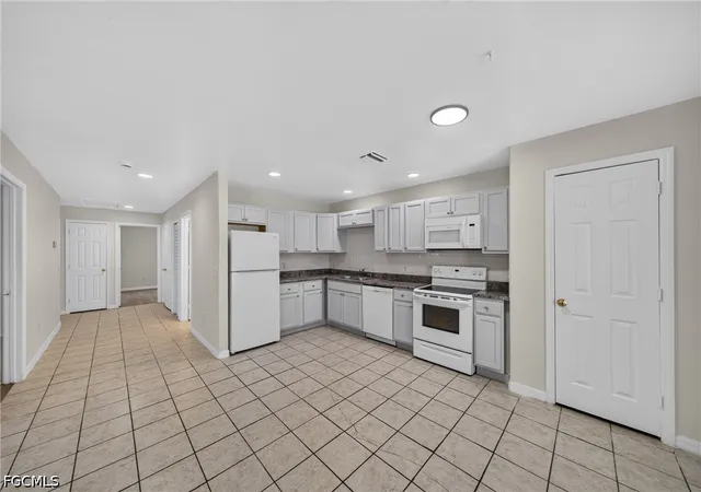 Listing Photo 5 - Condo for sale in building located at 4732/4734 Leonard Blvd S, Lehigh Acres, FL 33973