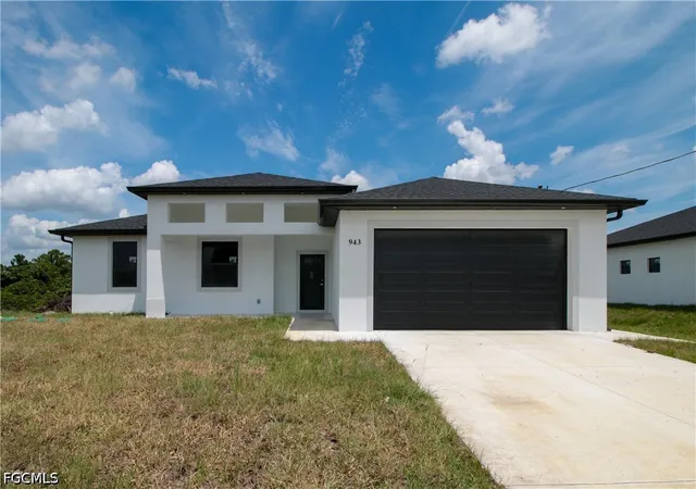 Photo 1 of Single family home for sale at 943 Commodore St, Lehigh Acres, FL 33974 | MLS# 2026038226 | Listing updated on 2026-09-10