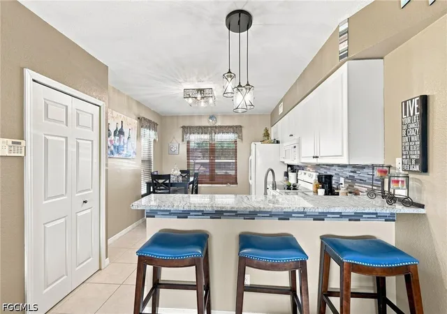 Listing Photo 4 - Condo for sale in building located at 406 Sw 3Rd St, Cape Coral, FL 33991 - Unit #102