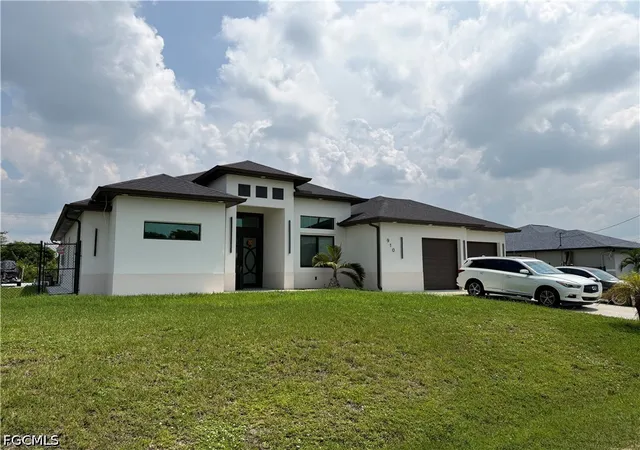 Photo 4 of Single family home for sale at 910 Venice Ave N, Lehigh Acres, FL 33971 | MLS# 2026038338 | Listing updated on 2026-09-11