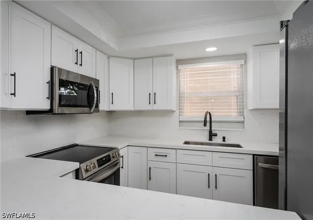 Listing Photo 4 - Condo for sale in building located at 5419 Rattlesnake Hammock Rd, Naples, FL 34113 - Unit #107F