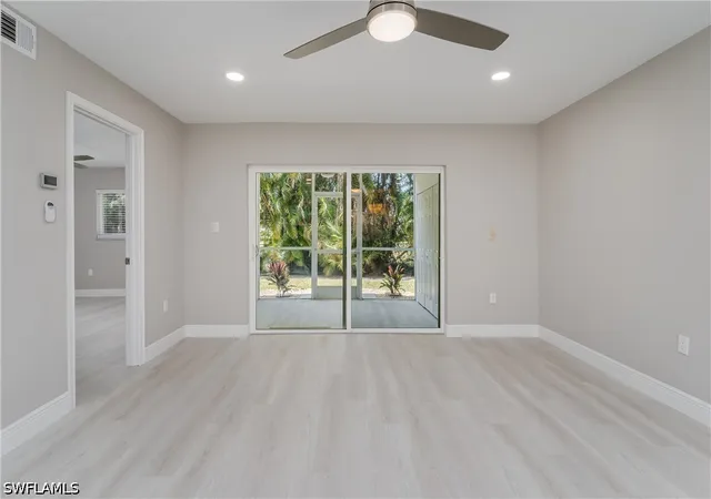 Listing Photo 5 - Condo for sale in building located at 5419 Rattlesnake Hammock Rd, Naples, FL 34113 - Unit #107F