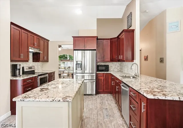 Photo 3 of Single family home for sale at 713 Milwaukee Blvd, Lehigh Acres, FL 33974 | MLS# 2026038410 | Listing updated on 2026-09-12