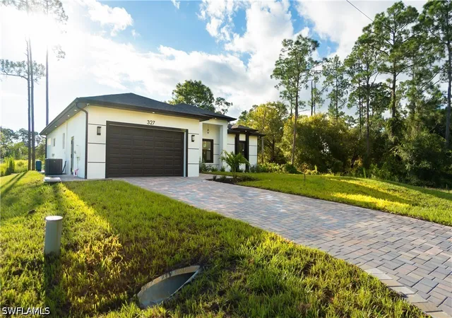 Photo 1 of Single family home for sale at 327 Lownde Ave S, Lehigh Acres, FL 33974 | MLS# 226032777 | Listing updated on 2026-09-13
