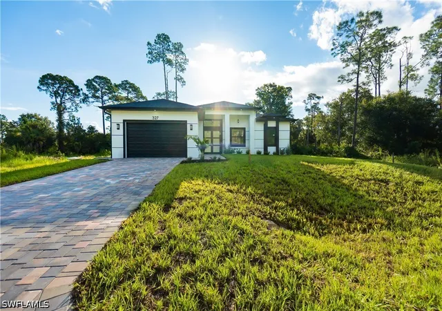 Photo 2 of Single family home for sale at 327 Lownde Ave S, Lehigh Acres, FL 33974 | MLS# 226032777 | Listing updated on 2026-09-13