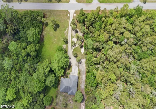 Photo 1 of Single family home for sale at 5681 Bur Oaks Ln, Naples, FL 34119 | MLS# 226032866 | Listing updated on 2026-09-11