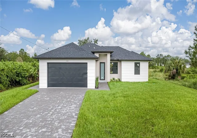 Photo 1 of Single family home for sale at 1222 Earnest St E, Lehigh Acres, FL 33974 | MLS# 2026038467 | Listing updated on 2026-09-14