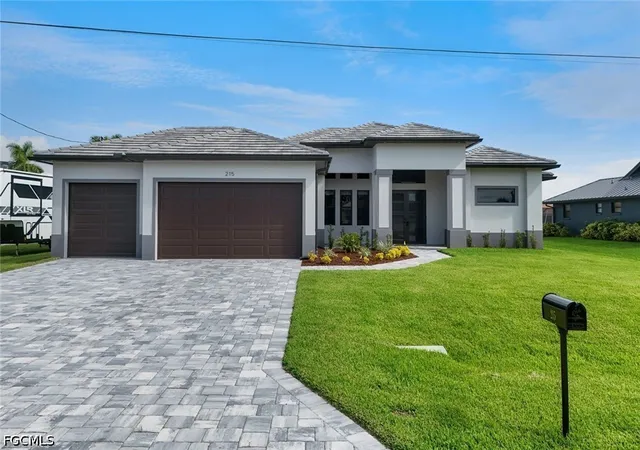 Photo 1 of Single family home for sale at 215 SW 37th Lane, Cape Coral, FL 33914 | MLS# 2026038484 | Listing updated on 2026-09-14