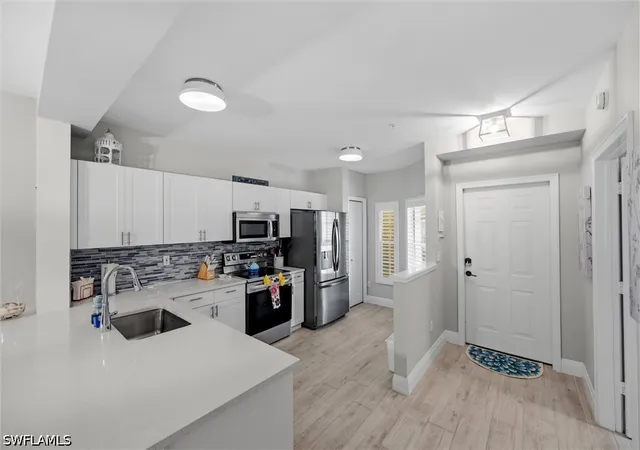 Listing Photo 5 - Condo for sale in building located at 9165 Celeste Dr, Naples, FL 34113 - Unit #103
