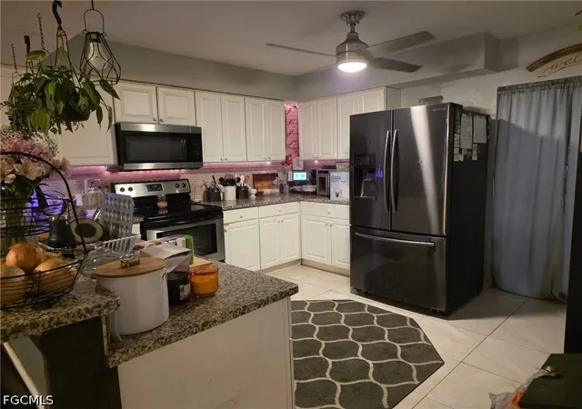 Photo 2 of Multi family home for sale at 1026 Ne 8th Place, Cape Coral, FL 33909 | MLS# 2026038506 | Listing updated on 2026-09-12