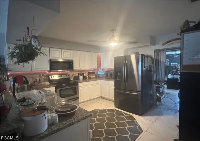 Photo 4 of House for sale at 1026 NE 8th Place, Cape Coral, FL 33909 | MLS# 2026038506 | Listing updated on 2026-10-16