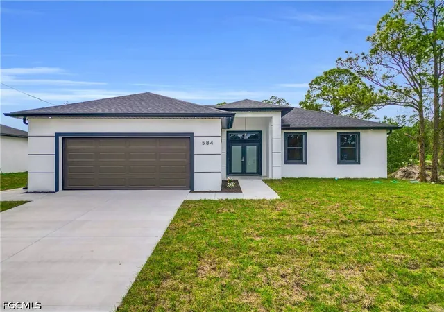 Photo 1 of Single family home for sale at 584 Genoa Ave S, Lehigh Acres, FL 33974 | MLS# 2026038540 | Listing updated on 2026-09-12