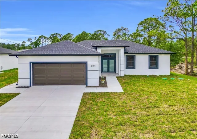 Photo 2 of Single family home for sale at 584 Genoa Ave S, Lehigh Acres, FL 33974 | MLS# 2026038540 | Listing updated on 2026-09-12