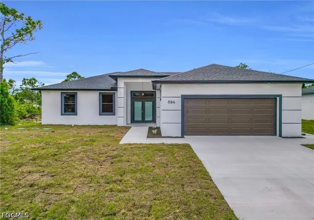 Photo 3 of Single family home for sale at 586 Genoa Ave S, Lehigh Acres, FL 33974 | MLS# 2026038541 | Listing updated on 2026-09-12