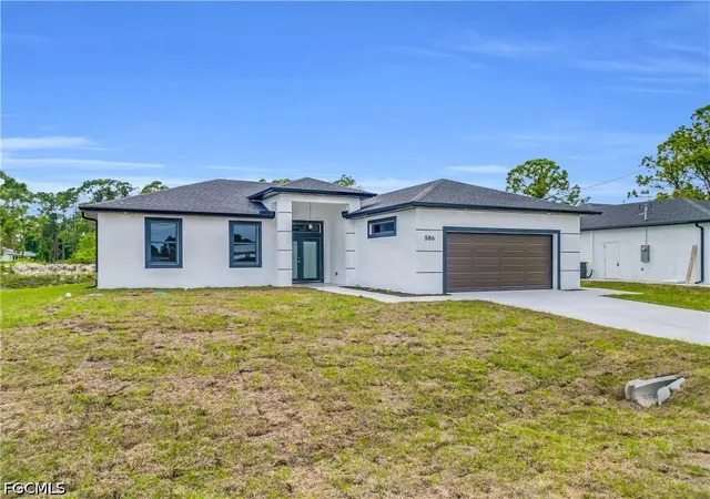 Photo 3 of Single family home for sale at 586 Genoa Ave S, Lehigh Acres, FL 33974 | MLS# 2026038541 | Listing updated on 2026-09-12