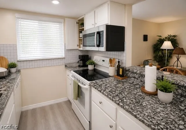 Listing Photo 5 - Condo for sale in building located at 3355 Royal Canadian Trace, Fort Myers, FL 33907 - Unit #4