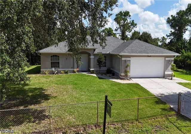 Photo 1 of Single family home for sale at 1025 Iris St E, Lehigh Acres, FL 33974 | MLS# 2026038568 | Listing updated on 2026-09-15