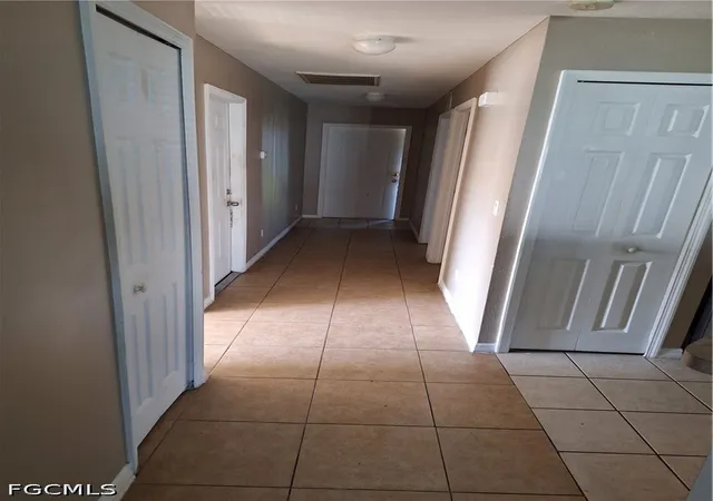 Photo 4 of House for sale at 919 Chenault St, Lehigh Acres, FL 33974 | MLS# 2026038686 | Listing updated on 2026-09-16