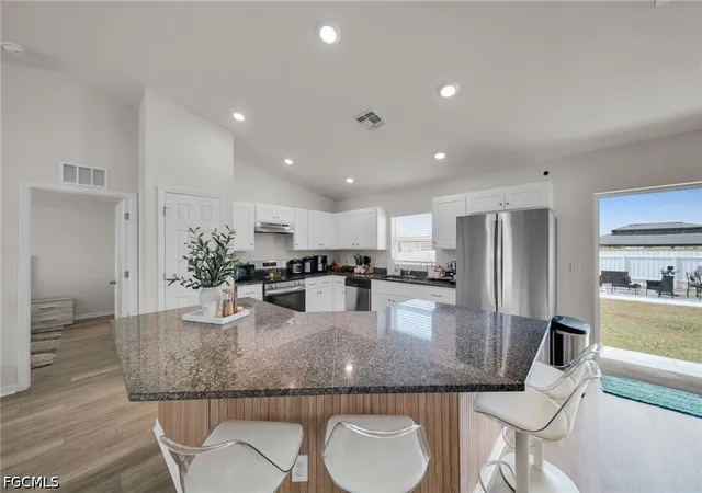 Photo 3 of Single family home for sale at 1219 Nw 15th Terrace, Cape Coral, FL 33993 | MLS# 2026038776 | Listing updated on 2026-09-15