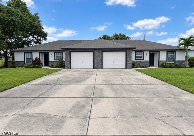 Multi family home for sale at 704 / 706 Gretchen Ave S, Lehigh Acres, FL 33973 | MLS# 2026038782