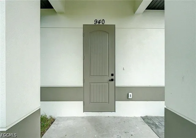 Photo 2 of Single family home for sale at 940 Lakeside Dr, Lehigh Acres, FL 33974 | MLS# 2026038788 | Listing updated on 2026-09-16