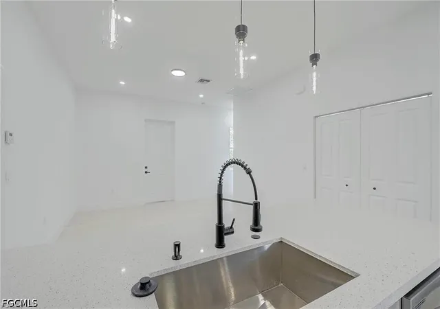 Photo 4 of Single family home for sale at 940 Lakeside Dr, Lehigh Acres, FL 33974 | MLS# 2026038788 | Listing updated on 2026-09-16
