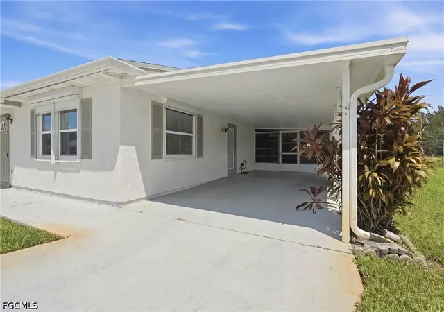 Photo 1 of Townhouse for sale at 7 Dutch Iris Ln, Lehigh Acres, FL 33936 | MLS# 2026038803 | Listing updated on 2026-10-06