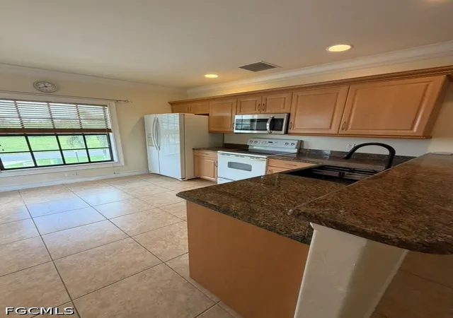 Photo 2 of Condo for sale at 4921 SW 16th Place #202, Cape Coral, FL 33914 | MLS# 2026038807 | Listing updated on 2026-09-15