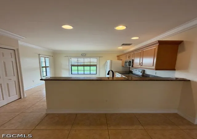 Photo 3 of Condo for sale at 4921 SW 16th Place #202, Cape Coral, FL 33914 | MLS# 2026038807 | Listing updated on 2026-09-15