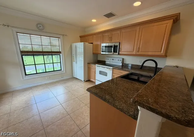 Photo 4 of Condo for sale at 4921 SW 16th Place #202, Cape Coral, FL 33914 | MLS# 2026038807 | Listing updated on 2026-09-15