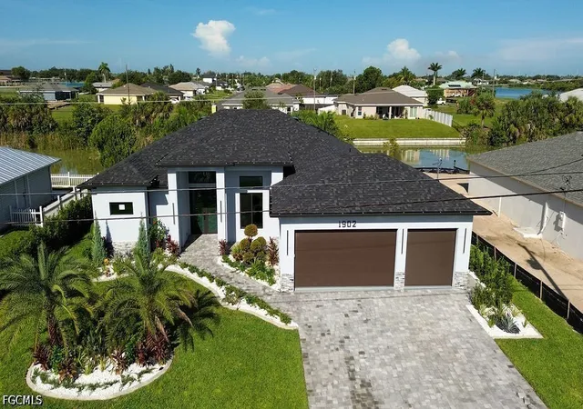 Photo 2 of Single family home for sale at 1902 Ne 13th Place, Cape Coral, FL 33909 | MLS# 2026038856 | Listing updated on 2026-09-16