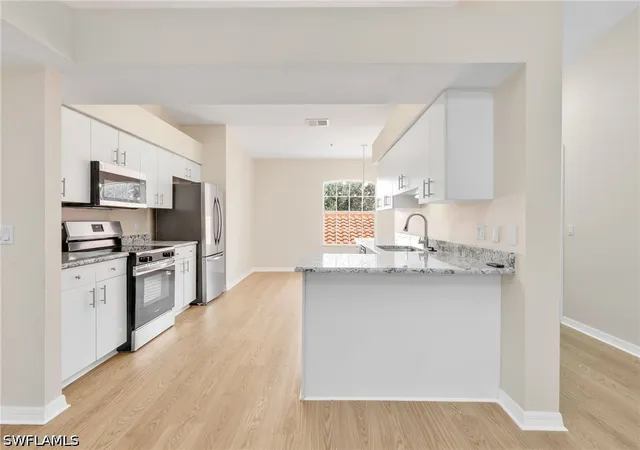 Listing Photo 4 - Condo for sale in building located at 26740 Rosewood Pointe Ln, Bonita Springs, FL 34135 - Unit #205