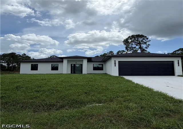Photo 1 of Single family home for sale at 1052 Grove St E, Lehigh Acres, FL 33974 | MLS# 2026038964 | Listing updated on 2026-09-16