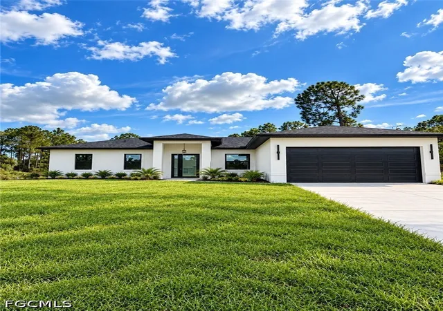 Photo 1 of Single family home for sale at 1052 Grove St E, Lehigh Acres, FL 33974 | MLS# 2026038964 | Listing updated on 2026-10-20